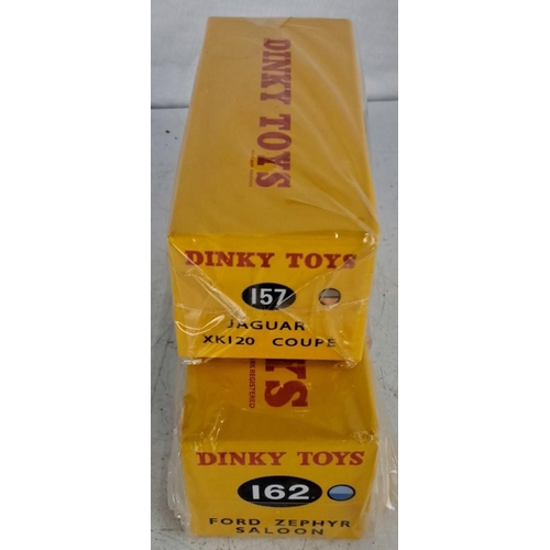 39 - 2 boxed Dinky Toys models to include Jaguar XK120 Coupe (No. 157) and Ford Zephyr Saloon (No. 162).