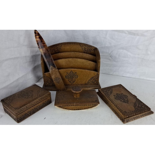 58 - This is a Vintage Italian Leather Desk Set includes a letter holder, inkwell, letter opener, a notep... 