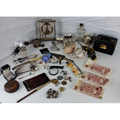 64 - A diverse mixed lot includes vintage watches, commemorative medallions, collectible brooches, an ant... 