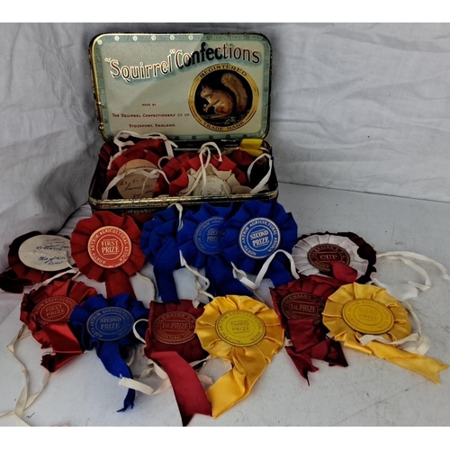 66 - The collection includes vintage local Agricultural prize ribbons of various colours. These ribbons a... 