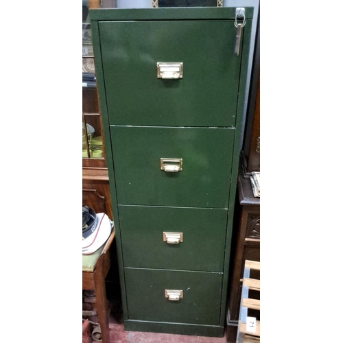 73 - Four-drawer painted green metal filing cabinet with brass handles and label holders. It features smo... 