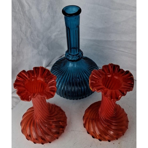 86 - This is a Mid-Century Modern glass set that includes a blue ribbed decanter and two orange/red ruffl... 