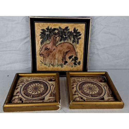 93 - Three framed hand-painted tiles by Tubeline Majolica are included. A rabbit motif and intricate flor... 