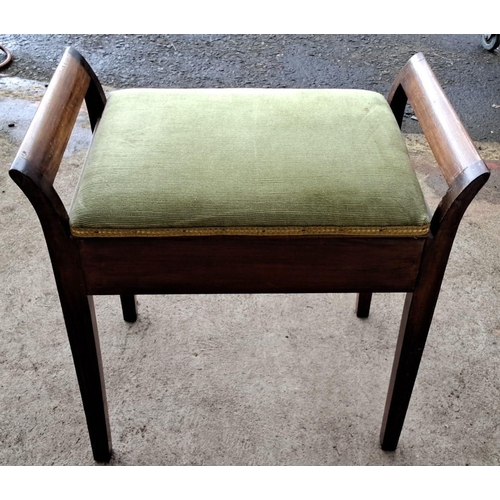 97 - Edwardian mahogany piano stool with upholstered green fabric seat. It has an under-seat storage comp... 