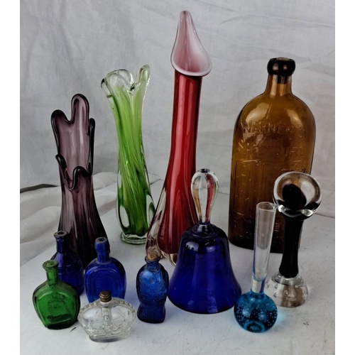 105 - A collection of vintage and antique glass bottles and vases. The collection features a variety of co... 