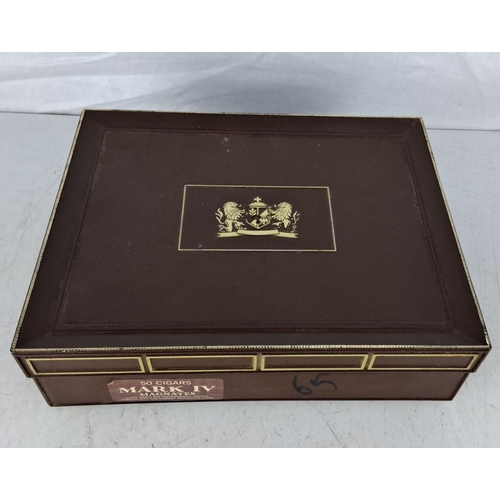 109 - Mark IV Magnates cigar box contains 10 cigars. This box showcases a gold-embossed crest and contains... 