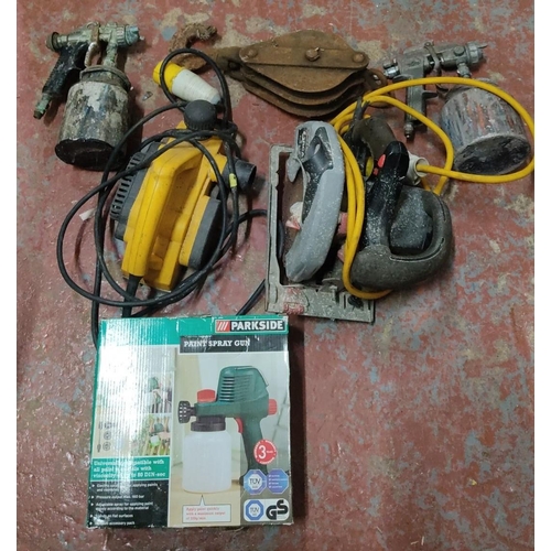 458 - This lot comprises a DeWalt planer, a Skilsaw circular saw, two paint spray guns, and a Parkside pai... 