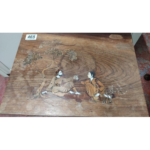 465 - This is a wooden side table with an intricate inlay of two figures under a tree, showcasing an Orien... 