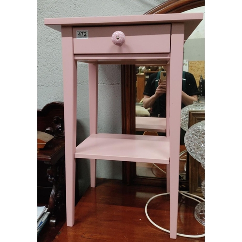 472 - Pink wooden side table with a single drawer, an ornate knob, and a lower shelf.