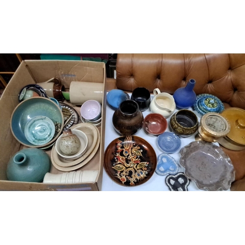 485 - The collection includes various pottery items such as vases, bowls, pitchers, and plates. The collec... 