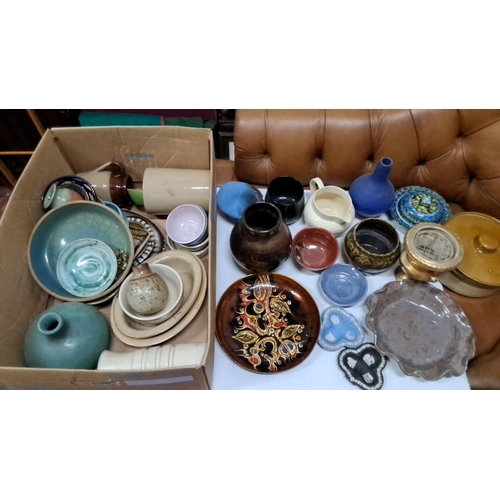 485 - The collection includes various pottery items such as vases, bowls, pitchers, and plates. The collec... 