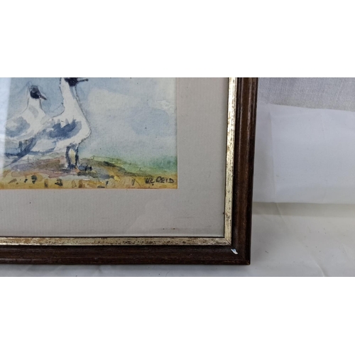 24 - A small watercolour painting of seagulls by H.C. Reid. It is framed with a gilt-edged wooden border.... 