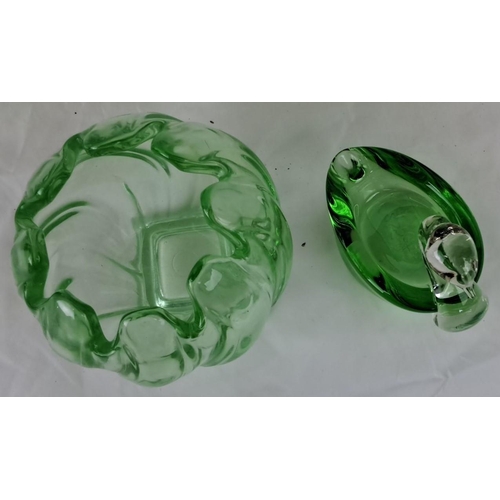 25 - Two vintage green glass items. Includes a ruffled vase and a swan-shaped dish.