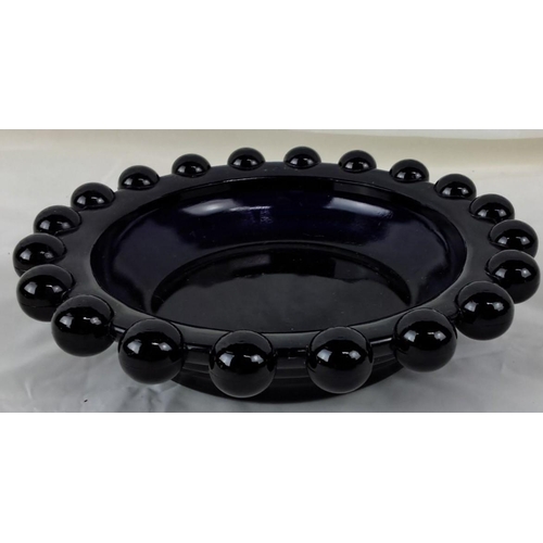 27 - Vintage black glass bowl with prominent beaded rim design, from the mid-century modern period.