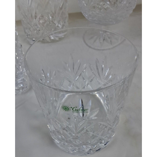 31 - Galway Irish Crystal decanter and four Galway Crystal glasses featuring intricate diamond-cut patter... 