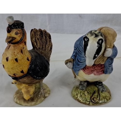 64 - Pair of figurines by Beswick England. The characters depicted are 