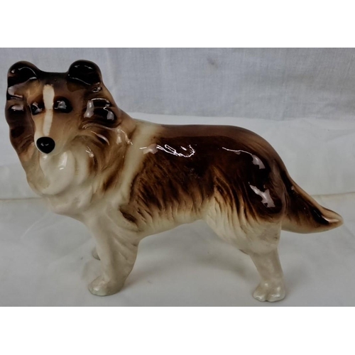 66 - A Coopercraft ceramic figurine of a Collie dog, produced in England. It is detailed and hand-painted... 