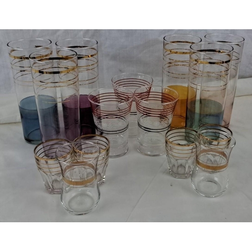 67 - This is a 14-piece set of assorted vintage glassware with gold and red accent stripes. The set inclu... 