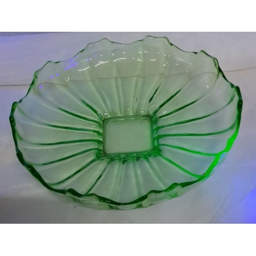 71 - Vintage Uranium glass bowl with scalloped edges. From the mid-20th century.