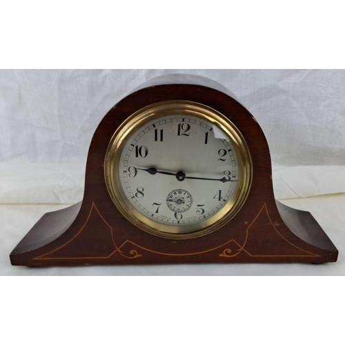 80 - French mantel clock with brass bezel in mahogany case, featuring lion trademark. From the early 20th... 