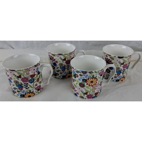 84 - This is a set of four ceramic mugs from Shannonbridge Ireland with a floral pattern.