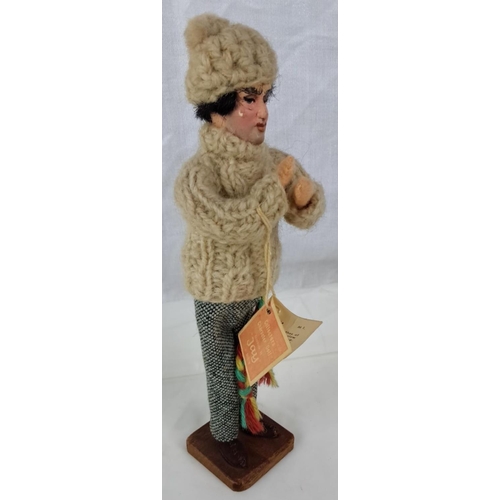 99 - This is a Aran Fisherman Doll. It's outfitted in traditional knitted attire, tweed pants and colourf... 