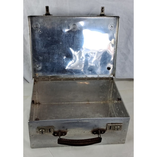 115 - Vintage metal storage lockbox featuring dual latches and a handle. The interior is raw metal. The di... 