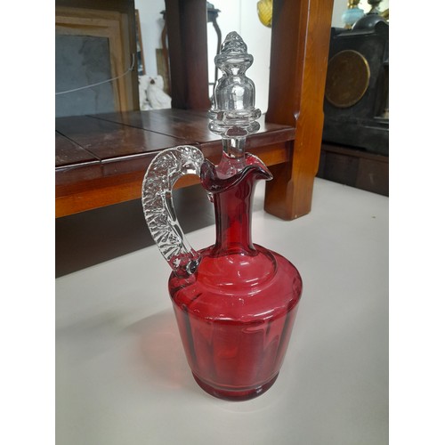 86 - Antique Ruby glass decanter and stopper.