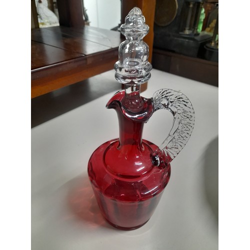 86 - Antique Ruby glass decanter and stopper.