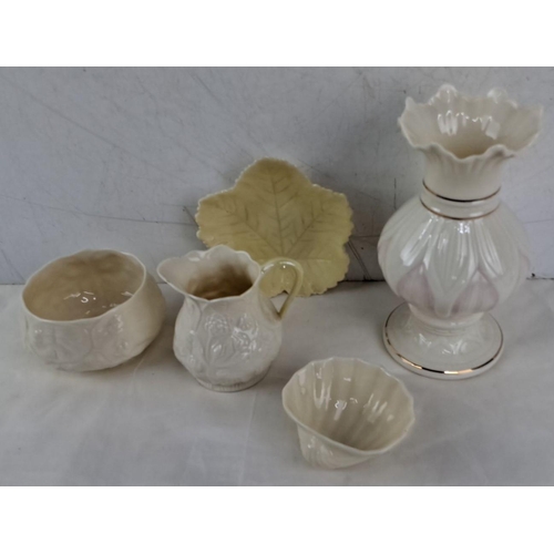 642 - This set includes six cream-colored ceramic pieces. The set features a jug, bowl, vase, leaf plate, ... 