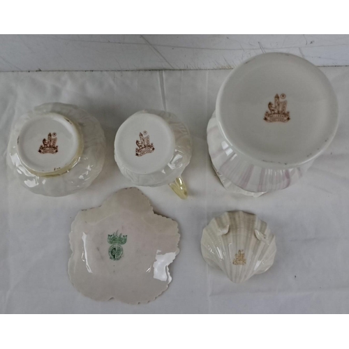 642 - This set includes six cream-colored ceramic pieces. The set features a jug, bowl, vase, leaf plate, ... 