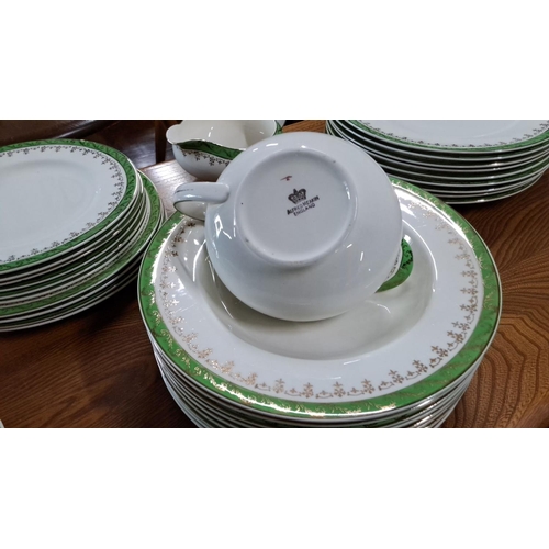 670 - A large vintage Alfred Meekin dinner set from England, showcasing green and gold floral design. The ... 