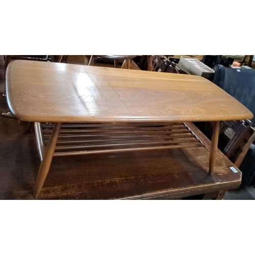 671 - Mid-Century Modern Ercol coffee table, featuring a slatted magazine shelf below, 100cm x 43cm x 36cm... 