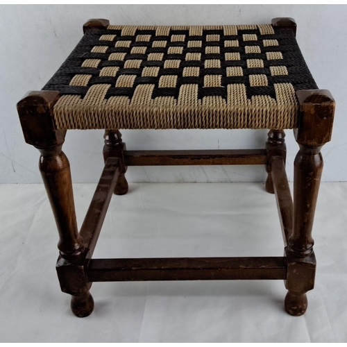 678 - Antique woven rope stool with turned wooden legs and a checkerboard-patterned seat. From the mid-20t... 