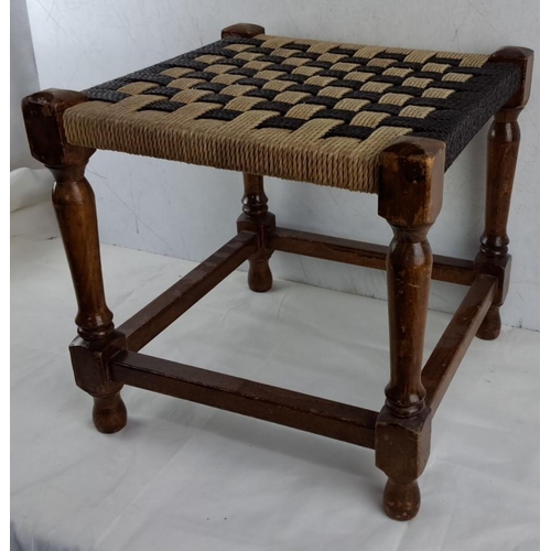 678 - Antique woven rope stool with turned wooden legs and a checkerboard-patterned seat. From the mid-20t... 