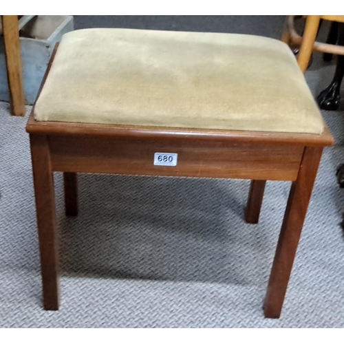 680 - This is a piano stool from Eavestaff featuring an upholstered seat and a mahogany frame.