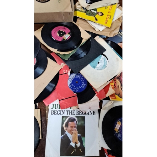 681 - This is a collection of vintage 45 RPM vinyl records. It features various artists and genres. Some o... 