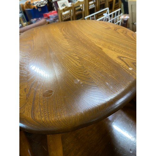 675 - Set of three mid-century modern 'Pebble' nesting tables by Ercol, largest table 65cm x 44cm x 41cm.