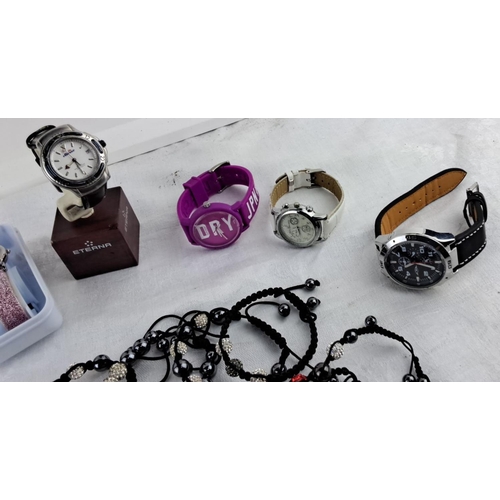 12 - Mixed lot including various wristwatches and fashion bracelets. Brands include Eterna. Also features... 