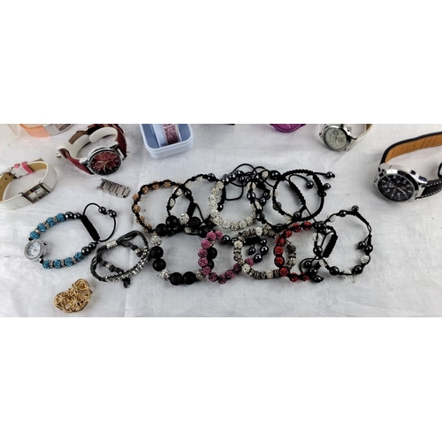 12 - Mixed lot including various wristwatches and fashion bracelets. Brands include Eterna. Also features... 