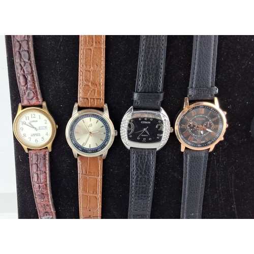 13 - Set of eight wristwatches featuring brands such as Lorus, Citron, and Eiger. Mixed leather straps in... 