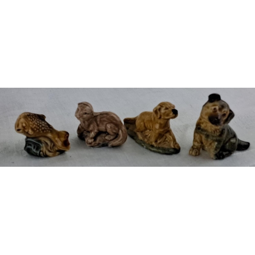 16 - Set of 9 Wade Whimsies featuring various animals including dogs, cats, an owl, and a decorative bowl... 