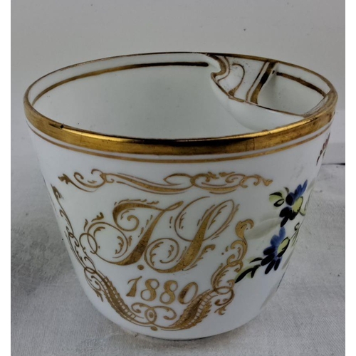 23 - A stunning Victorian hand painted Moustache Cup, dated 1880.