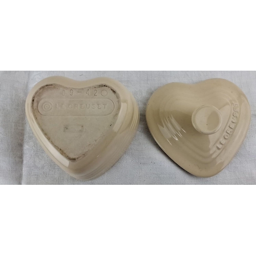 24 - Cream-colored Le Creuset heart-shaped stoneware dish with matching lid, marked 