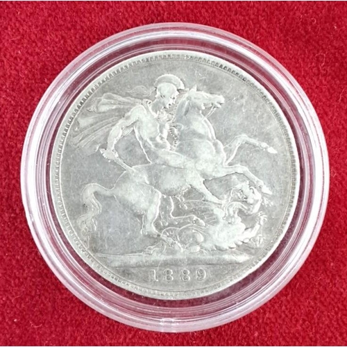 29 - 1889 British silver crown coin features Queen Victoria's bust on the obverse side and George slaying... 