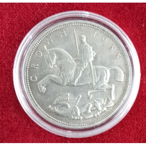 45 - 1935 George V Silver Jubilee Crown. Obverse features King George V's profile, reverse depicts St. Ge... 