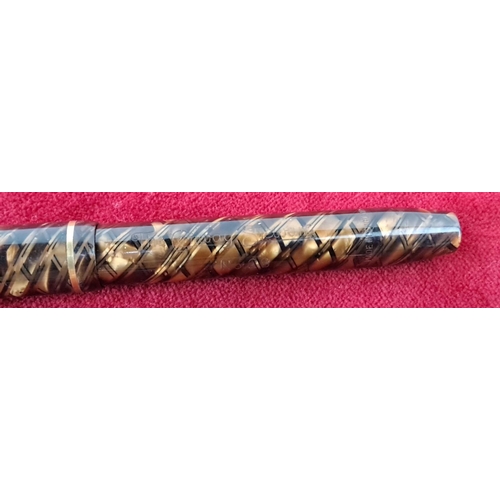 58 - 1930s Conway Stewart No. 28 Fountain Pen in marbled brown with amber and black accents, features a 1... 