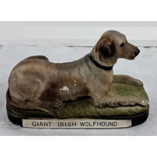 66 - Porcelain figurine of a Giant Irish Wolfhound, hand-painted with realistic detailing.