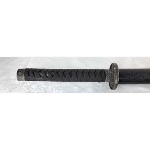 72 - Japanese katana with a black lacquered scabbard.