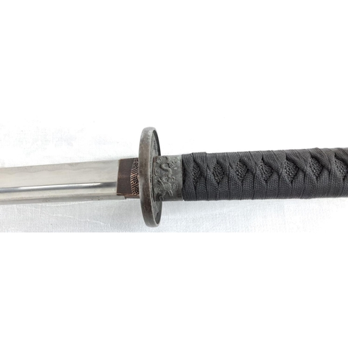 72 - Japanese katana with a black lacquered scabbard.